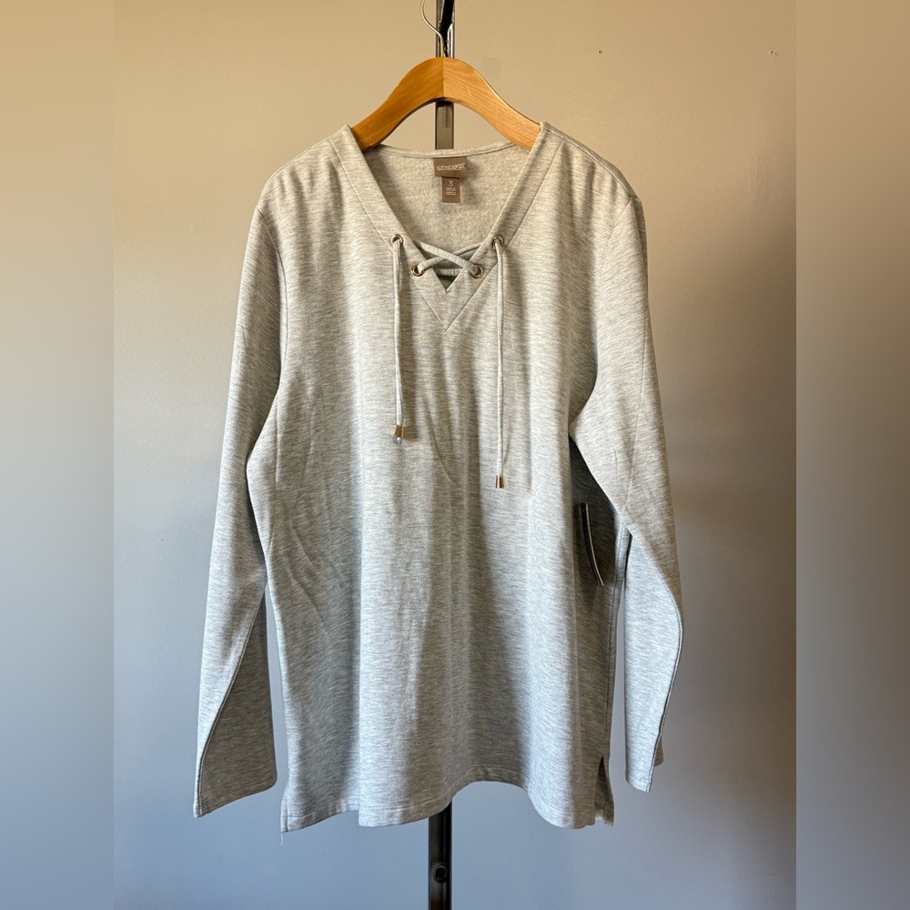 Chico’s…APPAREL LACE UP LS TUNIC TOP LS FASHION KINT LIGHT HEATHER GRAY
SIZE:3